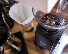 Load image into Gallery viewer, Dark image with pour over, kettle, and encore grinder with beans
