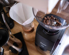 Load image into Gallery viewer, Dark image with pour over, kettle, and encore grinder with beans