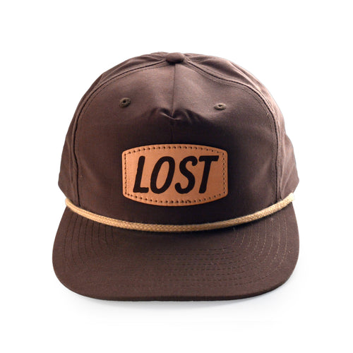 Brown cap with 'LOST' patch on a white background
