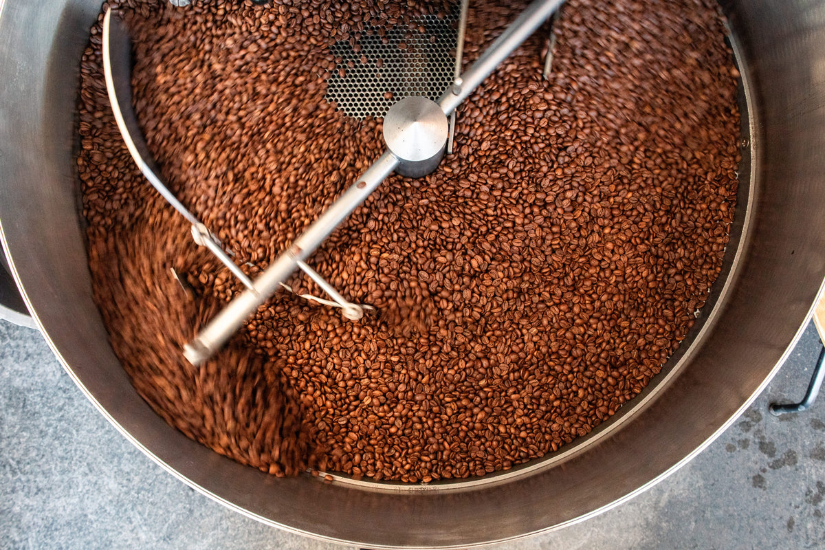 roasting bin with decaf coffee beans that can be used for wholesale